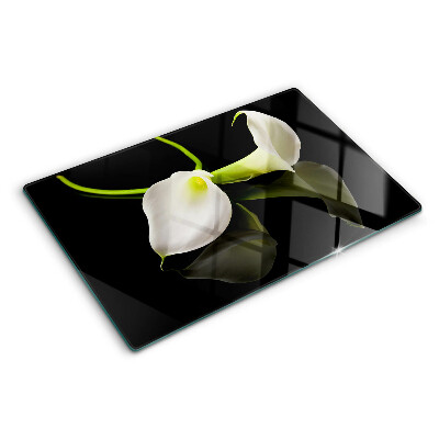 Glazen snijplanken Lelie op een zwarte achtergrond