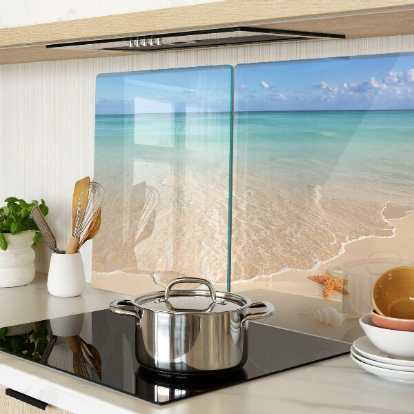 Snijplanken glas Strand met schelpen en golven