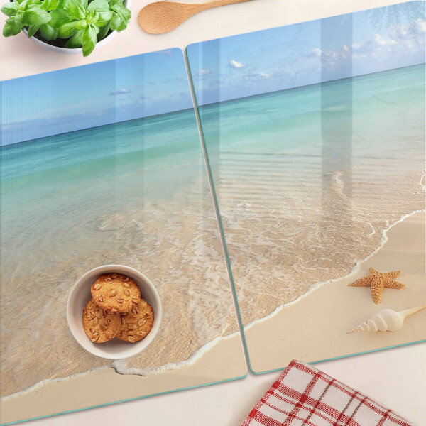 Deska kuchenna szklana Plaża z muszlami i falami