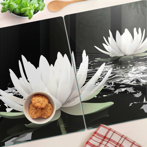 Glazen snijplanken Waterlelies op een zwarte achtergrond