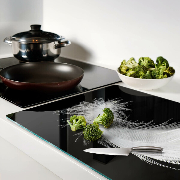 Szklana deska do krojenia Pióro na czarnym tle