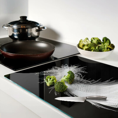 Szklana deska do krojenia Pióro na czarnym tle