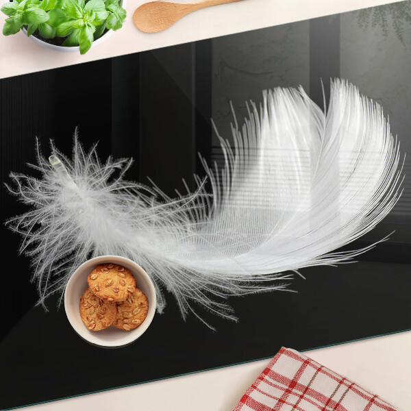 Szklana deska do krojenia Pióro na czarnym tle