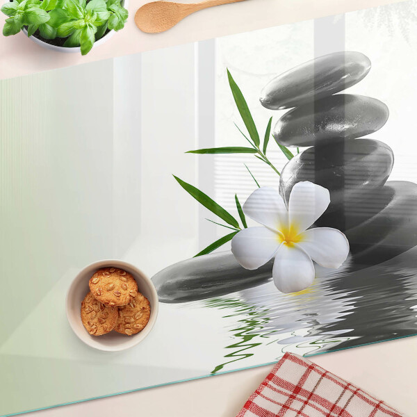 Szklana deska kuchenna Kwiaty i kamienie na wodzie