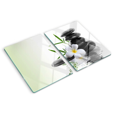 Snijplanken glas Bloemen en stenen op het water