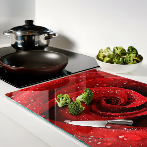 Glazen snijplanken Rode roos met waterdruppels