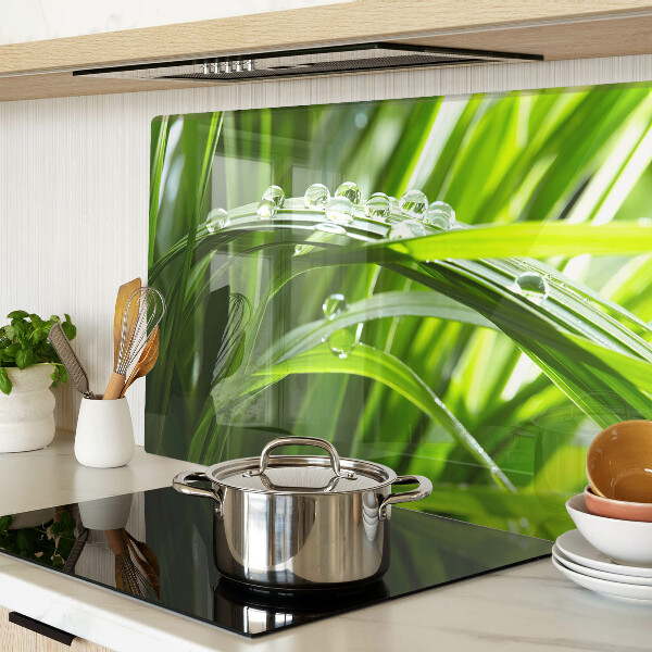 Snijplanken glas Waterdruppels op het gras