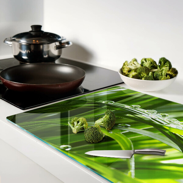 Snijplanken glas Waterdruppels op het gras