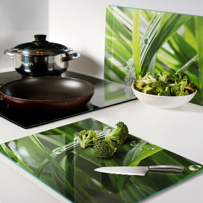 Snijplanken glas Waterdruppels op het gras