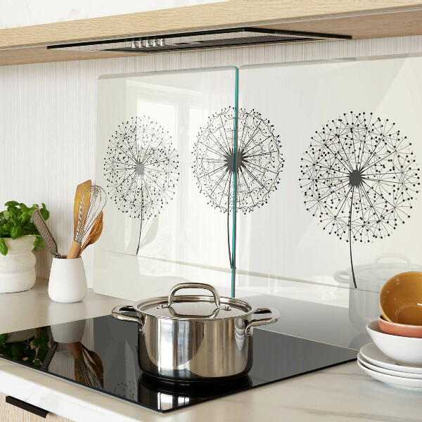 Snijplanken glas Paardenbloemen op een witte achtergrond