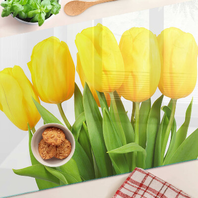 Snijplanken glas Gele tulpen op een groene achtergrond