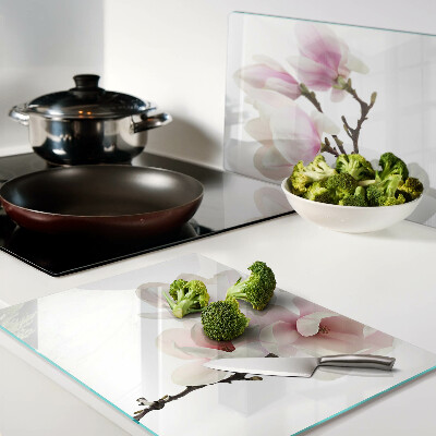 Snijplanken van glas Magnoliabloemen aan een tak