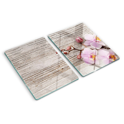 Snijplanken glas Orchideeën op een houten achtergrond