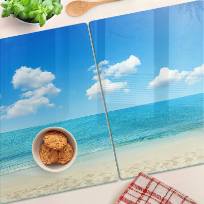 Snijplanken glas Strand met een blauwe lucht