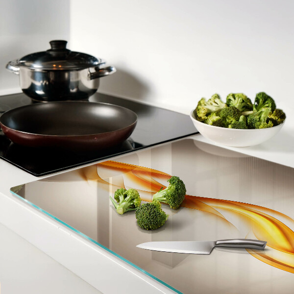 Szklana deska kuchenna Fale w odcieniach złota