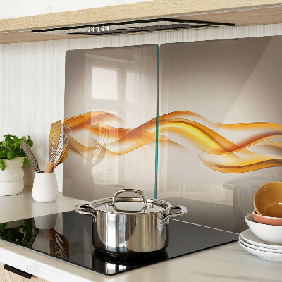 Szklana deska kuchenna Fale w odcieniach złota
