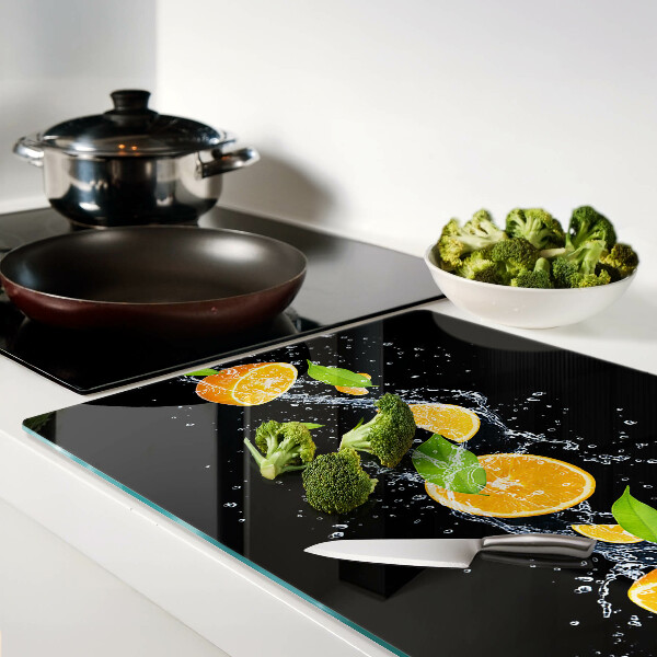 Snijplanken glas Citrusvruchten in water