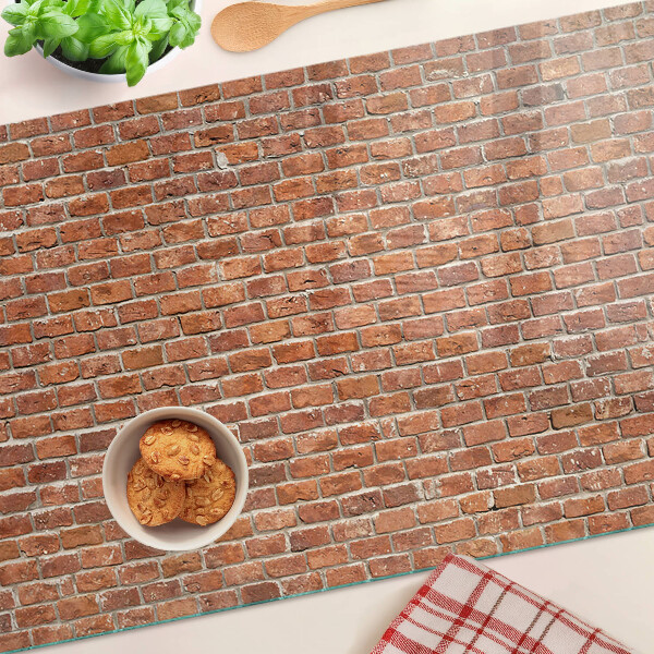 Snijplanken van glas Bakstenen muur