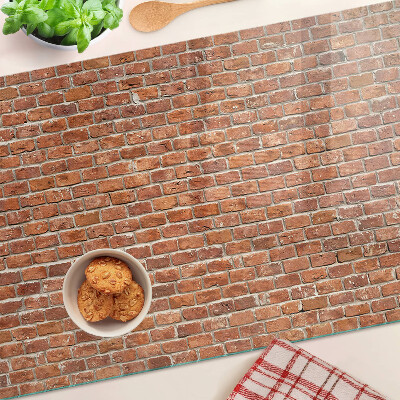 Snijplanken van glas Bakstenen muur