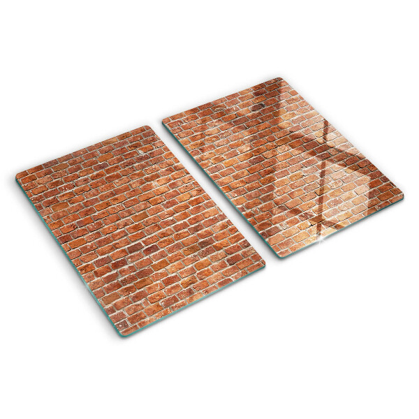 Snijplanken van glas Bakstenen muur