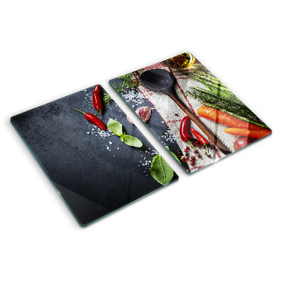 Snijplanken van glas Keukenkruiden en groenten