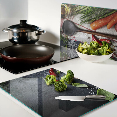 Snijplanken van glas Keukenkruiden en groenten