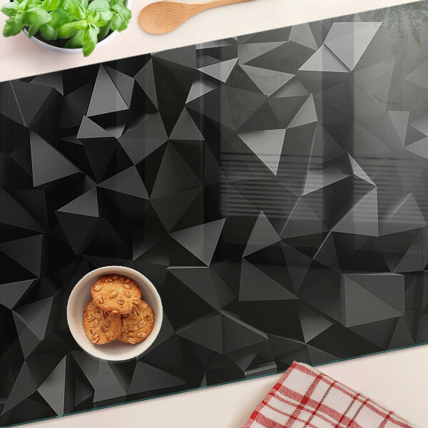 Snijplanken van glas Veelhoekige geometrie in zwarttinten
