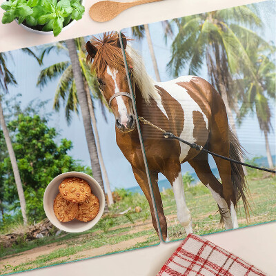 Glazen snijplanken Een paard met palmbomen op de achtergrond.