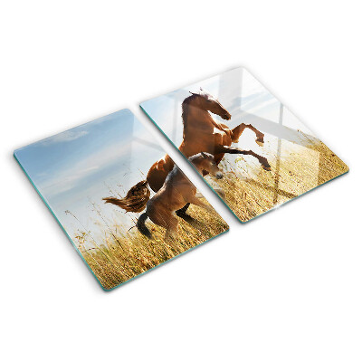 Glazen snijplanken Paarden in een weiland in de zon.