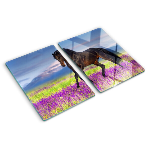 Snijplanken glas Een paard tegen een achtergrond van paarse bloemen