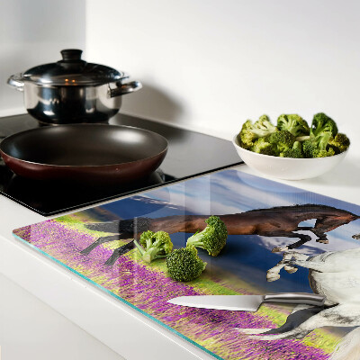 Szklana deska kuchenna Konie na tle gór i kwiatów