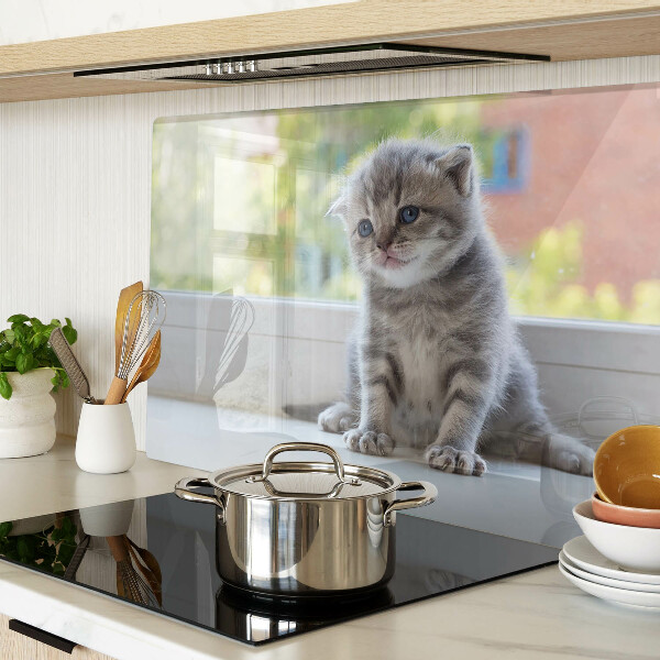 Glazen snijplanken Een kitten op de vensterbank.