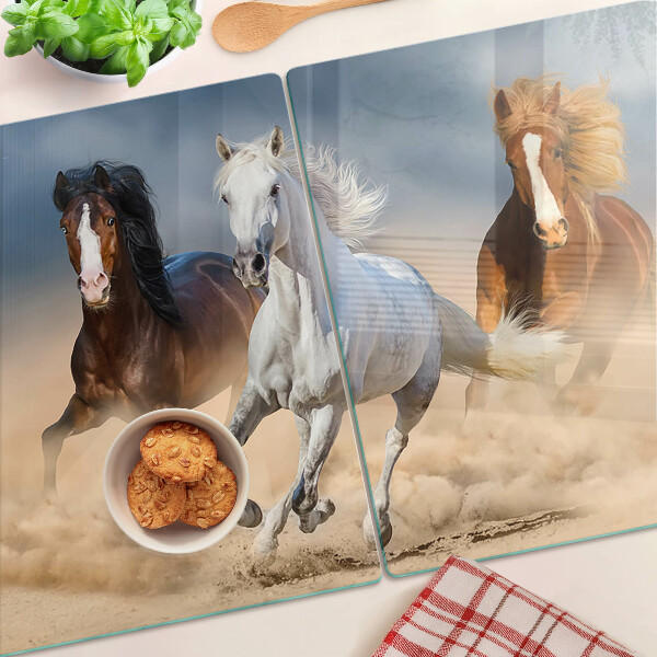 Snijplanken van glas Drie galopperende paarden