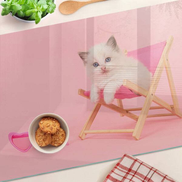 Szklana deska do krojenia Kotek na leżaku na różowym tle