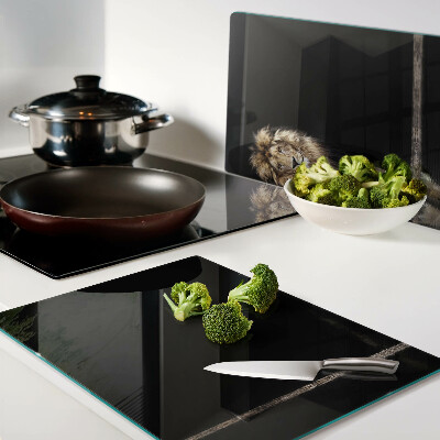 Szklana deska kuchenna Lew na ciemnym tle