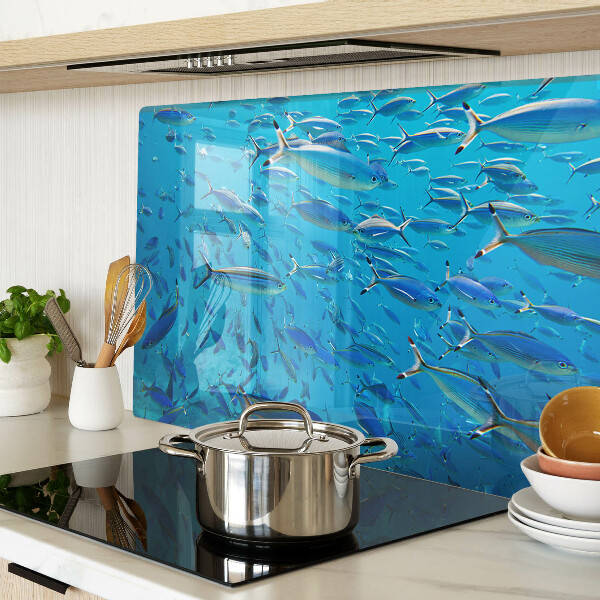 Snijplanken glas Een school vissen in helder water