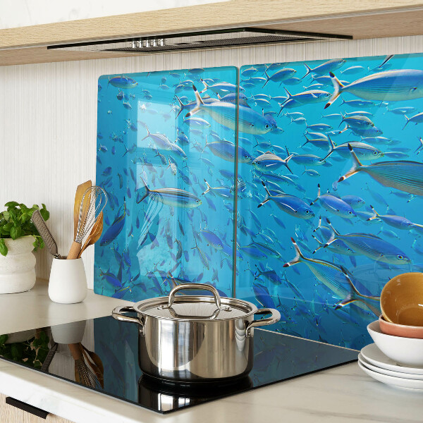 Snijplanken glas Een school vissen in helder water