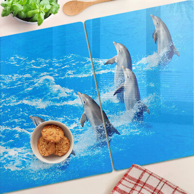 Glazen snijplanken Dolfijnen die over de golven springen