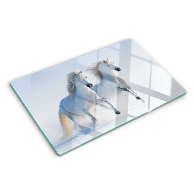 Glazen snijplanken Twee witte paarden in een dolle galop.