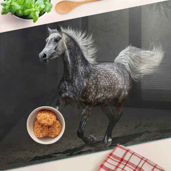 Snijplanken van glas Een gevlekt paard op de vlucht