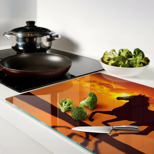 Szklana deska do krojenia Koń na tle zachodzącego słońca