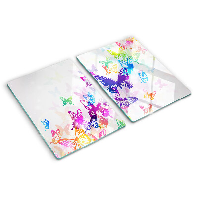 Snijplanken van glas Een motief van kleurrijke vlinders die wegvliegen.