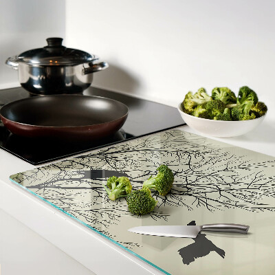 Deska kuchenna szklana Ptaki na gałęziach drzew