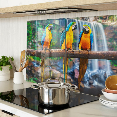 Glazen snijplanken Papegaaien op een tak in een tropisch bos