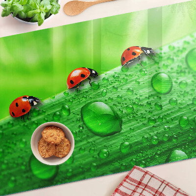 Deska kuchenna szklana Biedronki na zielonym tle