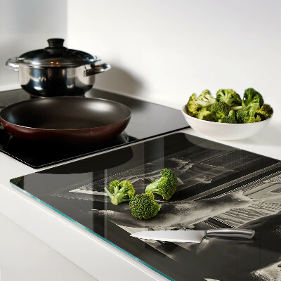 Szklana deska kuchenna Koty przy oknie