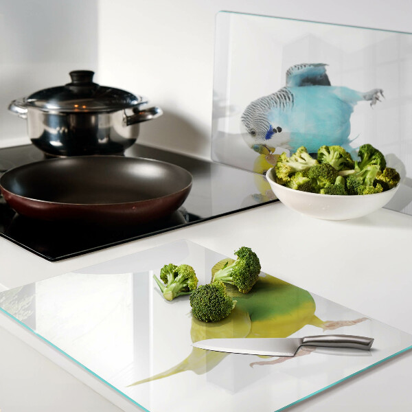 Deska kuchenna szklana Papugi w kolorach żółtym i niebieskim