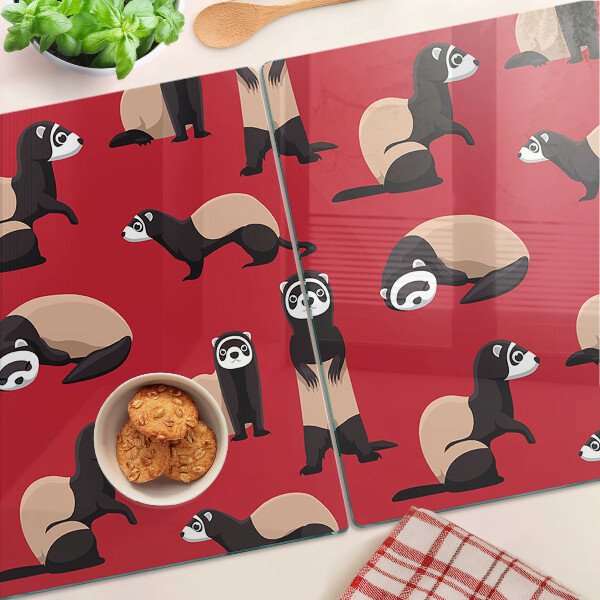 Snijplanken van glas Fretten op een rode achtergrond