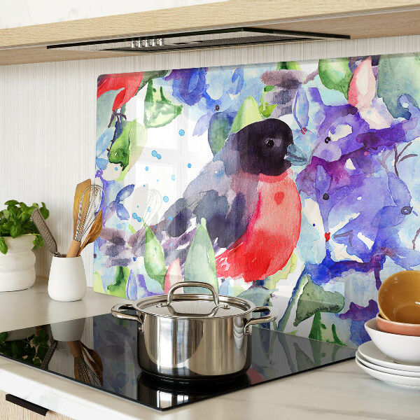 Snijplanken van glas Een vogel tegen een achtergrond van bloemen