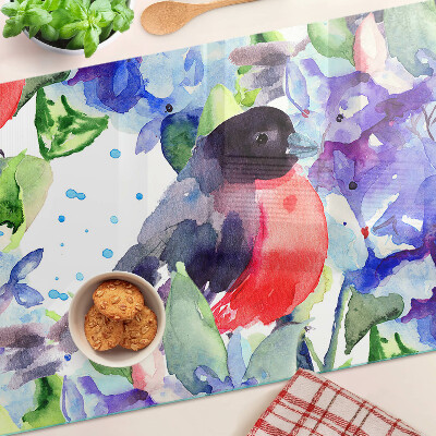 Szklana deska kuchenna Ptak na tle kwiatów